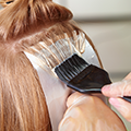 stylist applying color at mount joy pa hair salon