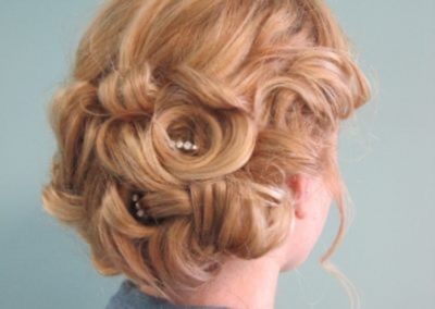 Rear view of a blond bridal updo
