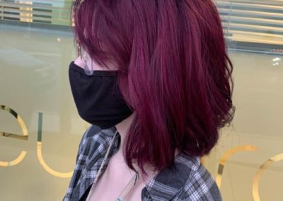 Side view of deep red hair